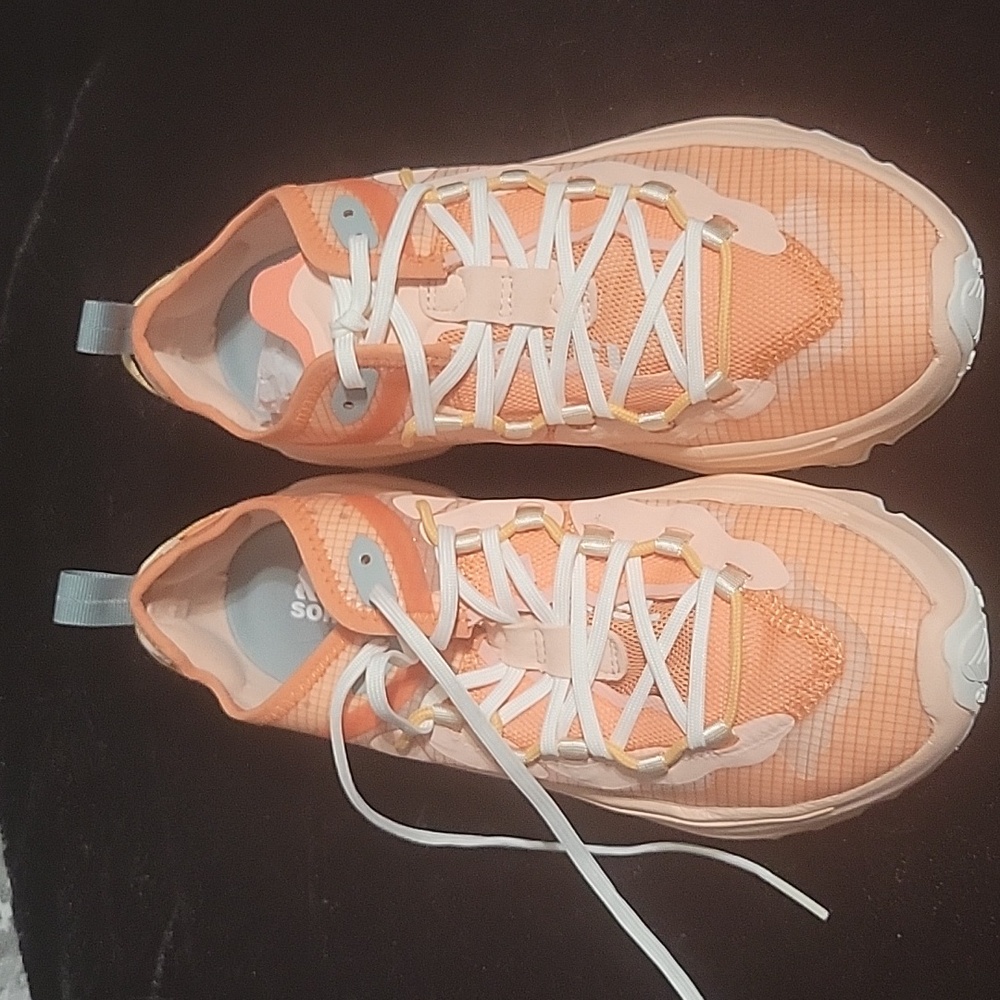 Ladies Sorel peach colored sneakers